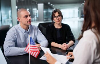 Consult with an immigration attorney to assess your eligibility for an immigration waiver and a U.S. visa.